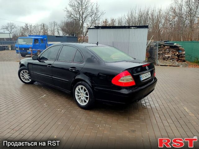 Чорний Мерседес Е-Клас, об'ємом двигуна 1.8 л та пробігом 386 тис. км за 9200 $, фото 4 на Automoto.ua