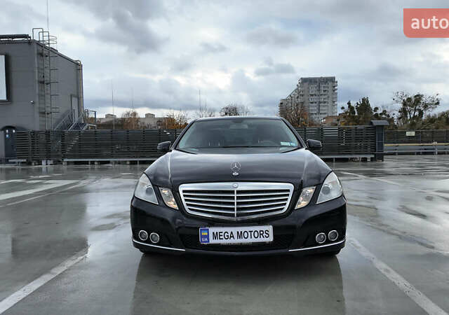 Черный Мерседес Е-Класс, объемом двигателя 5.5 л и пробегом 146 тыс. км за 14990 $, фото 1 на Automoto.ua