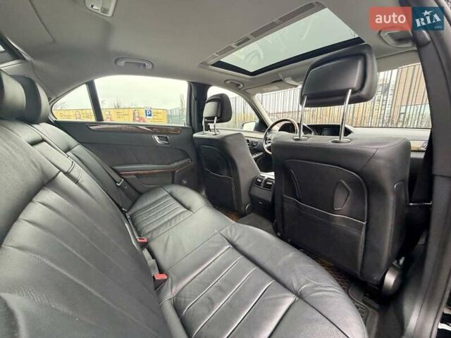 Черный Мерседес Е-Класс, объемом двигателя 5.5 л и пробегом 146 тыс. км за 16800 $, фото 23 на Automoto.ua