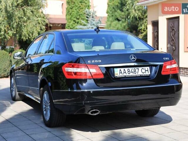 Чорний Мерседес Е-Клас, об'ємом двигуна 2 л та пробігом 43 тис. км за 18000 $, фото 37 на Automoto.ua
