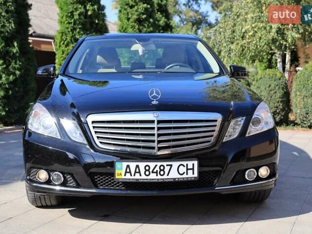 Чорний Мерседес Е-Клас, об'ємом двигуна 2 л та пробігом 43 тис. км за 18000 $, фото 34 на Automoto.ua