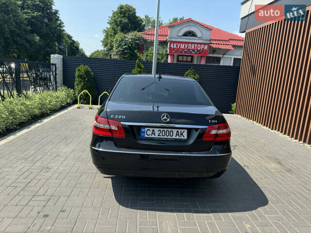Черный Мерседес Е-Класс, объемом двигателя 2.1 л и пробегом 310 тыс. км за 15500 $, фото 1 на Automoto.ua