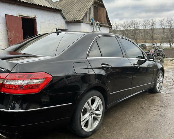 Чорний Мерседес Е-Клас, об'ємом двигуна 2.2 л та пробігом 200 тис. км за 15500 $, фото 4 на Automoto.ua