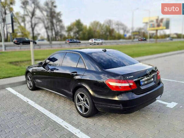 Чорний Мерседес Е-Клас, об'ємом двигуна 2.2 л та пробігом 203 тис. км за 12000 $, фото 1 на Automoto.ua