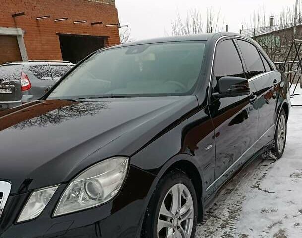 Черный Мерседес Е-Класс, объемом двигателя 2 л и пробегом 294 тыс. км за 11500 $, фото 1 на Automoto.ua