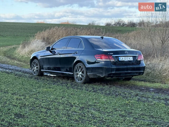 Черный Мерседес Е-Класс, объемом двигателя 2 л и пробегом 329 тыс. км за 13900 $, фото 4 на Automoto.ua