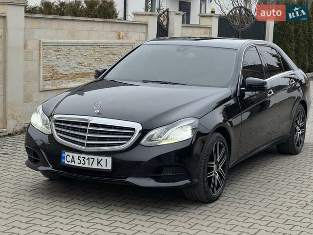 Чорний Мерседес Е-Клас, об'ємом двигуна 2 л та пробігом 329 тис. км за 13600 $, фото 1 на Automoto.ua