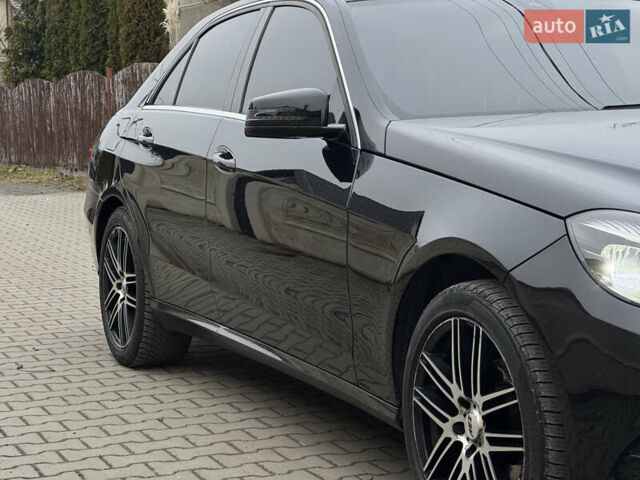 Чорний Мерседес Е-Клас, об'ємом двигуна 2 л та пробігом 329 тис. км за 13600 $, фото 5 на Automoto.ua