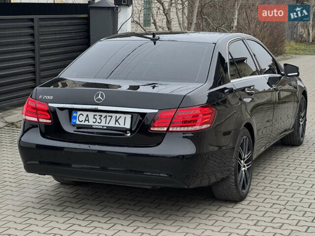 Чорний Мерседес Е-Клас, об'ємом двигуна 2 л та пробігом 329 тис. км за 13600 $, фото 7 на Automoto.ua