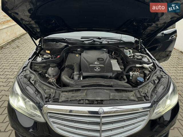 Чорний Мерседес Е-Клас, об'ємом двигуна 2 л та пробігом 329 тис. км за 13600 $, фото 24 на Automoto.ua
