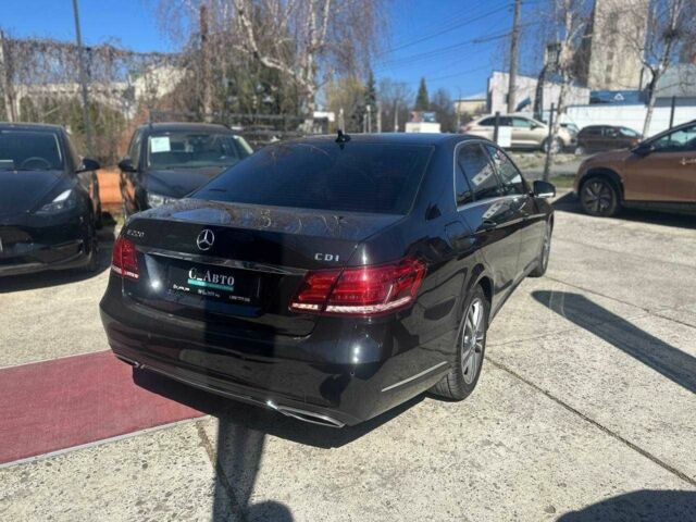 Черный Мерседес Е-Класс, объемом двигателя 2.2 л и пробегом 250 тыс. км за 18500 $, фото 1 на Automoto.ua