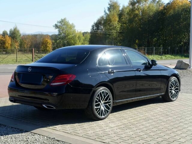 Чорний Мерседес Е-Клас, об'ємом двигуна 2 л та пробігом 31 тис. км за 20999 $, фото 4 на Automoto.ua