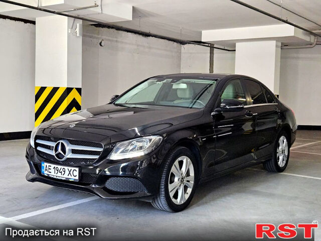 Черный Мерседес Е-Класс, объемом двигателя 2 л и пробегом 180 тыс. км за 26500 $, фото 1 на Automoto.ua