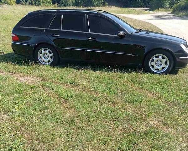 Черный Мерседес Е-Класс, объемом двигателя 2.2 л и пробегом 481 тыс. км за 6900 $, фото 1 на Automoto.ua