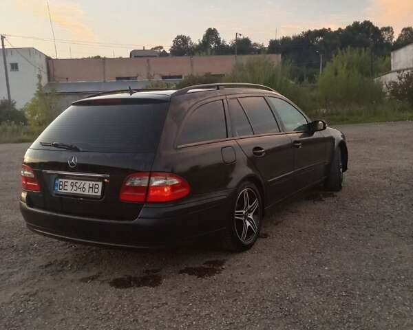 Чорний Мерседес Е-Клас, об'ємом двигуна 3.2 л та пробігом 359 тис. км за 5850 $, фото 6 на Automoto.ua