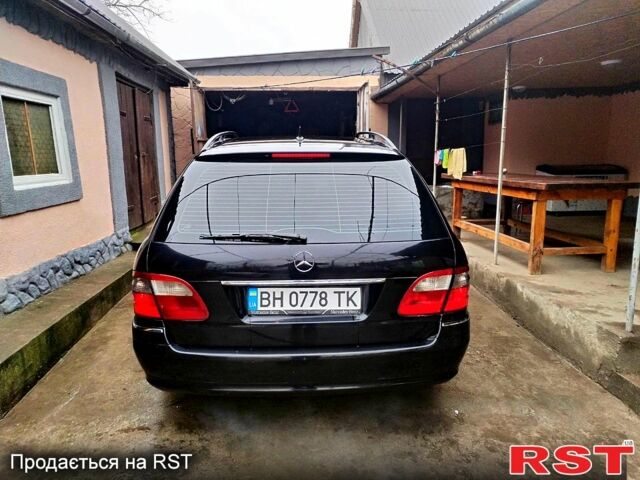 Черный Мерседес Е-Класс, объемом двигателя 2.1 л и пробегом 30400 тыс. км за 6500 $, фото 1 на Automoto.ua