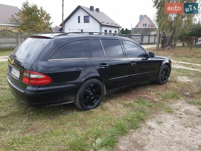 Чорний Мерседес Е-Клас, об'ємом двигуна 2.2 л та пробігом 324 тис. км за 9300 $, фото 6 на Automoto.ua