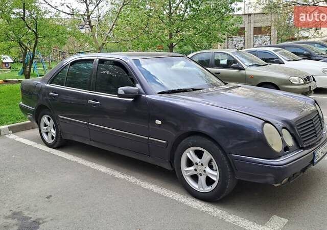 Фиолетовый Мерседес Е-Класс, объемом двигателя 2.79 л и пробегом 312 тыс. км за 1650 $, фото 2 на Automoto.ua