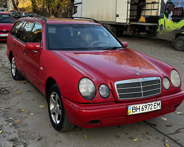 Красный Мерседес Е-Класс, объемом двигателя 2.3 л и пробегом 227 тыс. км за 2700 $, фото 4 на Automoto.ua