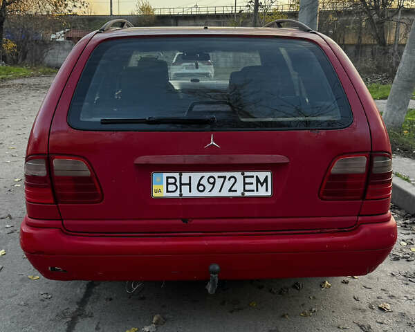 Красный Мерседес Е-Класс, объемом двигателя 2.3 л и пробегом 227 тыс. км за 2700 $, фото 6 на Automoto.ua