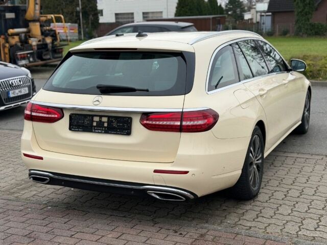 Жовтий Мерседес Е-Клас, об'ємом двигуна 2 л та пробігом 225 тис. км за 34970 $, фото 1 на Automoto.ua