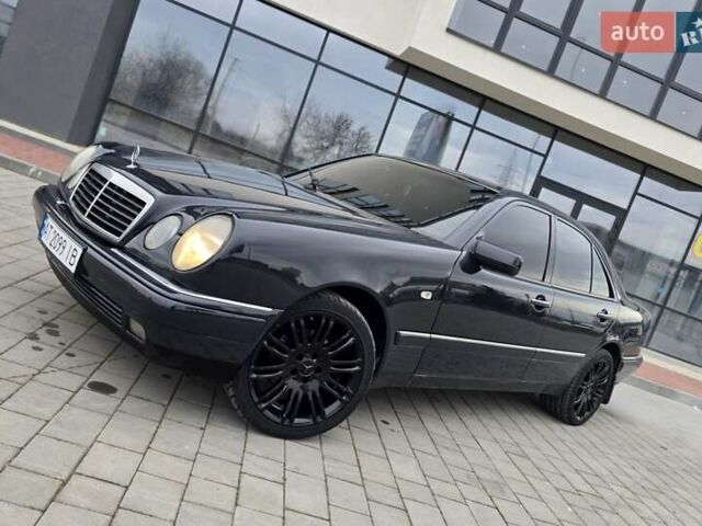 Сірий Мерседес Е-Клас, об'ємом двигуна 2 л та пробігом 245 тис. км за 3750 $, фото 61 на Automoto.ua