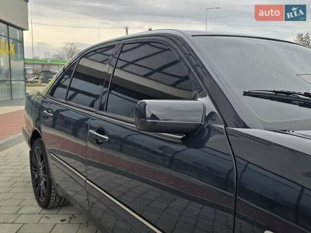 Сірий Мерседес Е-Клас, об'ємом двигуна 2 л та пробігом 245 тис. км за 3750 $, фото 27 на Automoto.ua