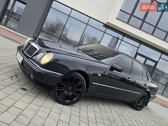 Сірий Мерседес Е-Клас, об'ємом двигуна 2 л та пробігом 245 тис. км за 3750 $, фото 60 на Automoto.ua