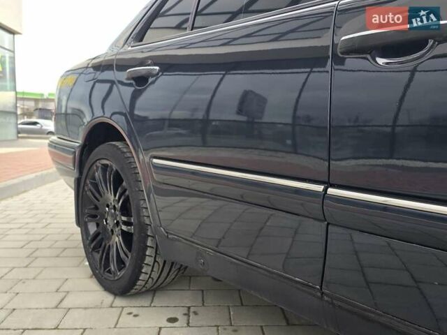 Сірий Мерседес Е-Клас, об'ємом двигуна 2 л та пробігом 245 тис. км за 3750 $, фото 26 на Automoto.ua