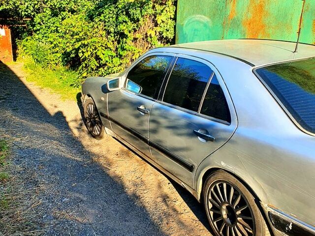 Сірий Мерседес Е-Клас, об'ємом двигуна 2 л та пробігом 0 тис. км за 3780 $, фото 1 на Automoto.ua