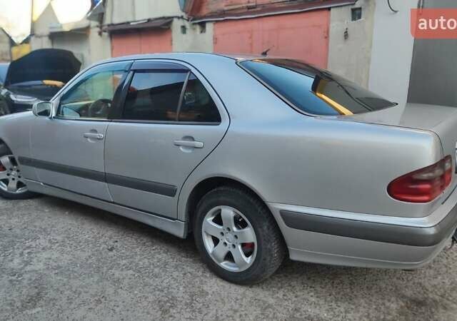 Сірий Мерседес Е-Клас, об'ємом двигуна 2 л та пробігом 389 тис. км за 4000 $, фото 7 на Automoto.ua