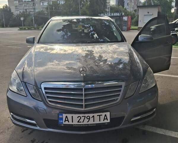 Серый Мерседес Е-Класс, объемом двигателя 2.14 л и пробегом 168 тыс. км за 14999 $, фото 1 на Automoto.ua