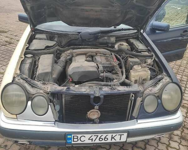 Синій Мерседес Е-Клас, об'ємом двигуна 2 л та пробігом 300 тис. км за 1800 $, фото 8 на Automoto.ua