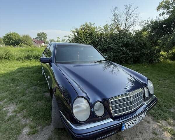 Синий Мерседес Е-Класс, объемом двигателя 2 л и пробегом 395 тыс. км за 3000 $, фото 1 на Automoto.ua