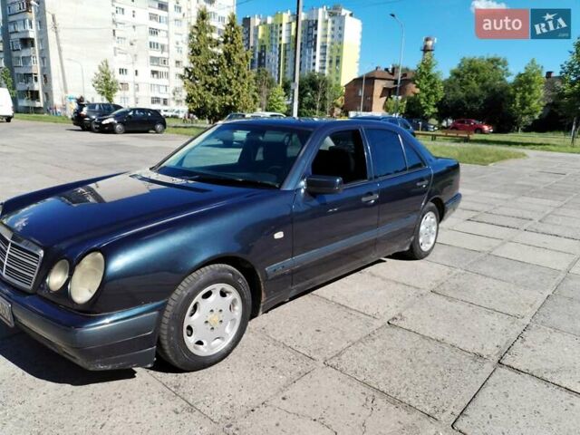 Синій Мерседес Е-Клас, об'ємом двигуна 2 л та пробігом 203 тис. км за 3600 $, фото 6 на Automoto.ua