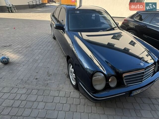 Синий Мерседес Е-Класс, объемом двигателя 2 л и пробегом 390 тыс. км за 4400 $, фото 1 на Automoto.ua