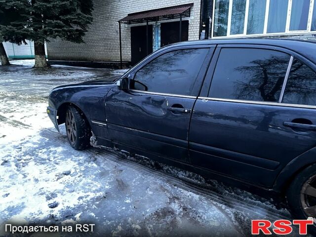 Синій Мерседес Е-Клас, об'ємом двигуна 2 л та пробігом 320 тис. км за 3000 $, фото 5 на Automoto.ua