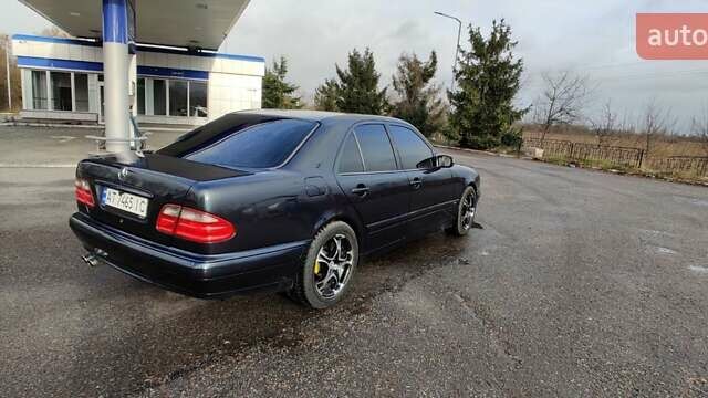 Синій Мерседес Е-Клас, об'ємом двигуна 2 л та пробігом 300 тис. км за 4700 $, фото 12 на Automoto.ua