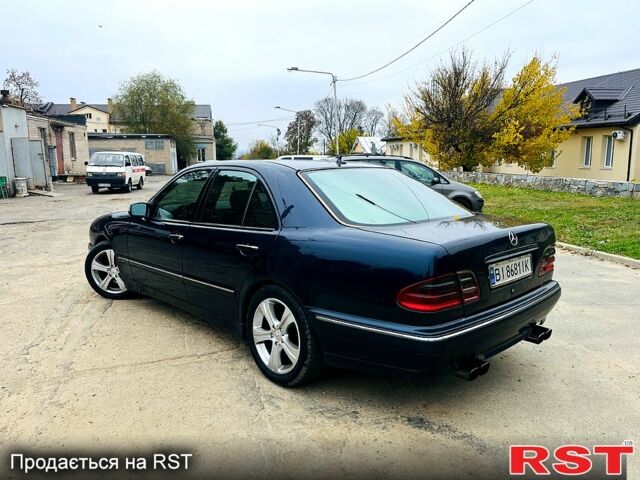 Синий Мерседес Е-Класс, объемом двигателя 2.1 л и пробегом 390 тыс. км за 5000 $, фото 4 на Automoto.ua