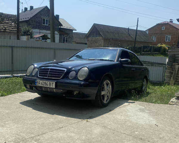 Синій Мерседес Е-Клас, об'ємом двигуна 2 л та пробігом 300 тис. км за 3700 $, фото 9 на Automoto.ua