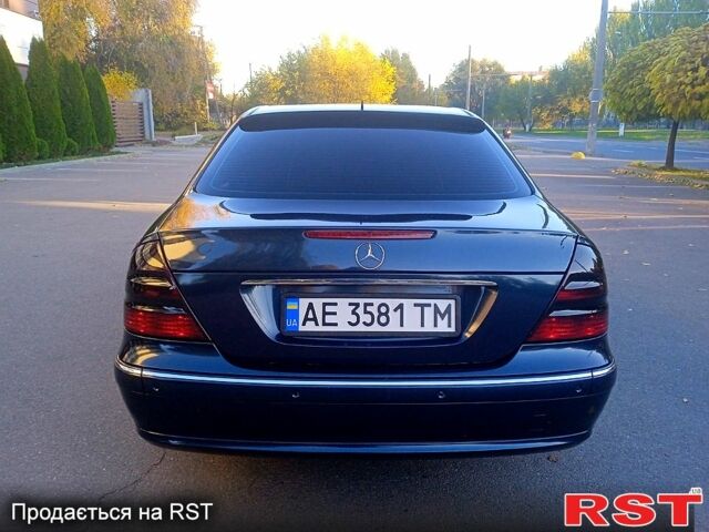 Синий Мерседес Е-Класс, объемом двигателя 2.1 л и пробегом 400 тыс. км за 6700 $, фото 1 на Automoto.ua