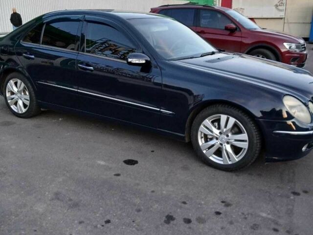 Синий Мерседес Е-Класс, объемом двигателя 2.1 л и пробегом 238 тыс. км за 7500 $, фото 1 на Automoto.ua