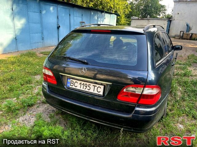 Синий Мерседес Е-Класс, объемом двигателя 3.2 л и пробегом 526 тыс. км за 6100 $, фото 2 на Automoto.ua