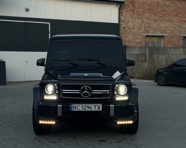 Черный Мерседес Г-Класс, объемом двигателя 5 л и пробегом 305 тыс. км за 18800 $, фото 2 на Automoto.ua