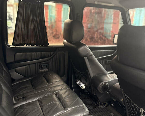 Черный Мерседес Г-Класс, объемом двигателя 4.97 л и пробегом 260 тыс. км за 19400 $, фото 13 на Automoto.ua