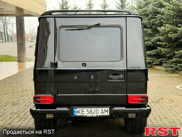 Чорний Мерседес Г-Клас, об'ємом двигуна 5 л та пробігом 284 тис. км за 24999 $, фото 4 на Automoto.ua