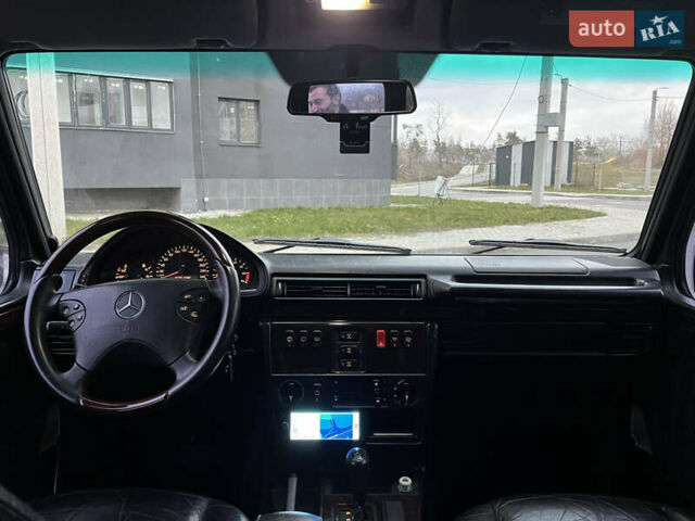 Черный Мерседес Г-Класс, объемом двигателя 5 л и пробегом 252 тыс. км за 20100 $, фото 1 на Automoto.ua
