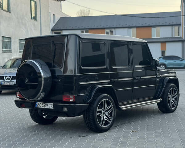 Черный Мерседес Г-Класс, объемом двигателя 5 л и пробегом 305 тыс. км за 18800 $, фото 4 на Automoto.ua