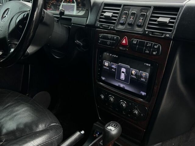 Чорний Мерседес Г-Клас, об'ємом двигуна 5 л та пробігом 258 тис. км за 21900 $, фото 2 на Automoto.ua