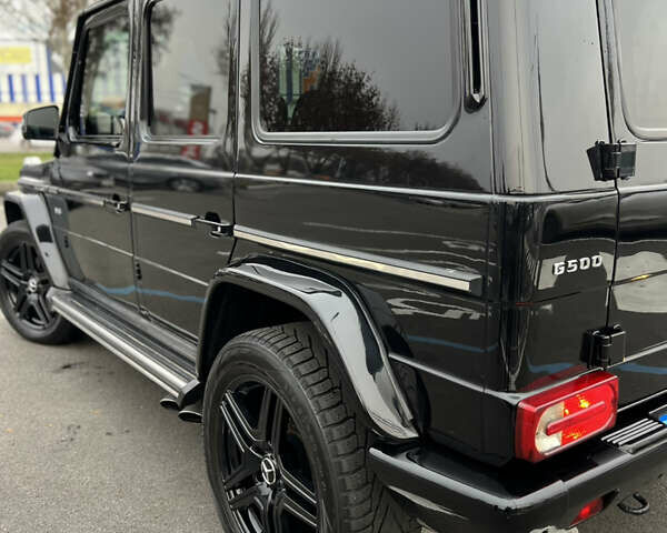 Чорний Мерседес Г-Клас, об'ємом двигуна 5 л та пробігом 259 тис. км за 23000 $, фото 5 на Automoto.ua